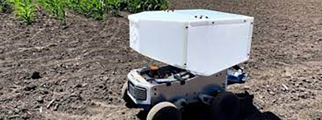 An agricultural robot in a field.